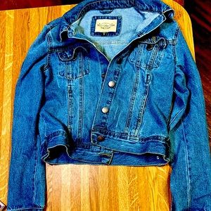 It is blue and is brand of Ashley vintage charm size small